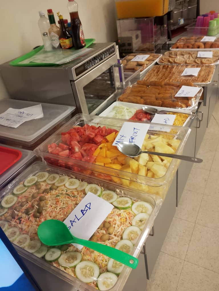 Salad, fresh fruit and pastry counter on the servery line